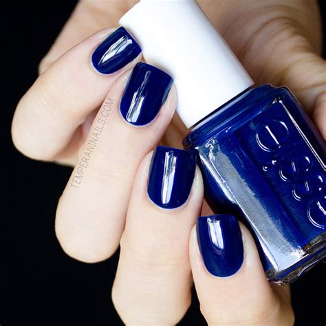 essie navy blue nail polish.